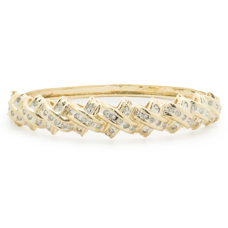 Ladies birthstone bracelets-14 Karat Yellow Gold Channel Set Diamond X Bangle Bracelet