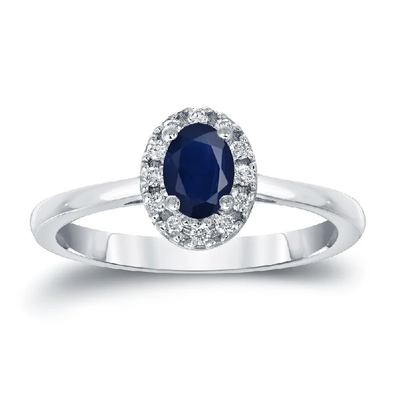 Ladies platinum engagement rings-Platinum 1/2ct Sapphire Oval and 1/10ct TDW Diamond Halo Engagement Ring (H-I, SI1-SI2)