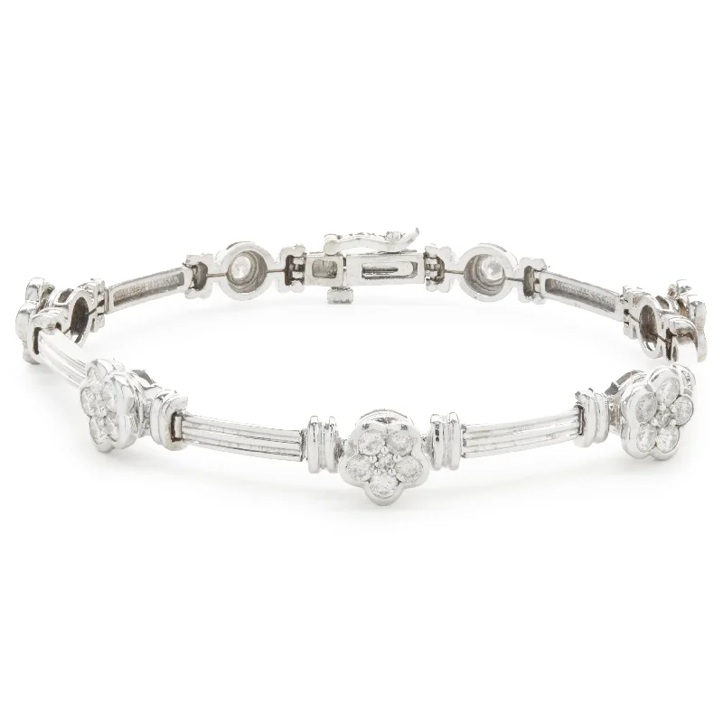 Ladies moonstone bracelets-14 Karat White Gold Pave Diamond Flower Station Bracelet