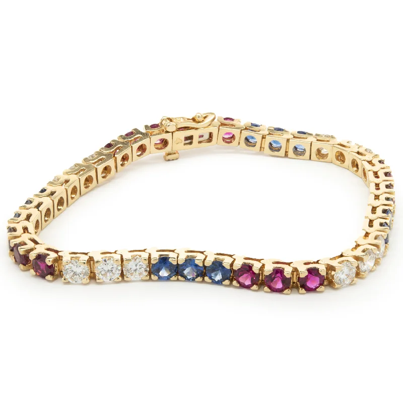 Ladies statement bracelets-14k Yellow Gold Diamond, Ruby, and Sapphire Tennis Bracelet