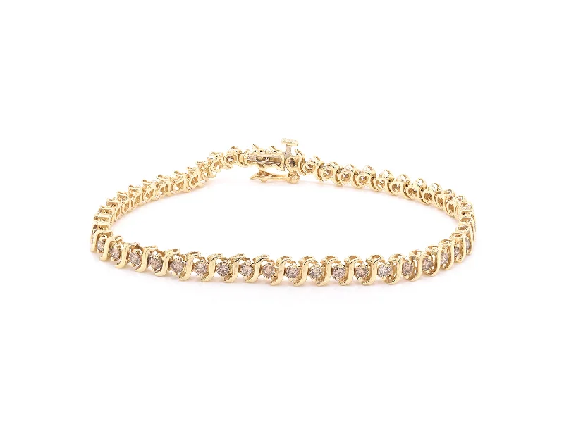 Ladies ruby bracelets-14 Karat Yellow Gold Diamond S Link Tennis Bracelet