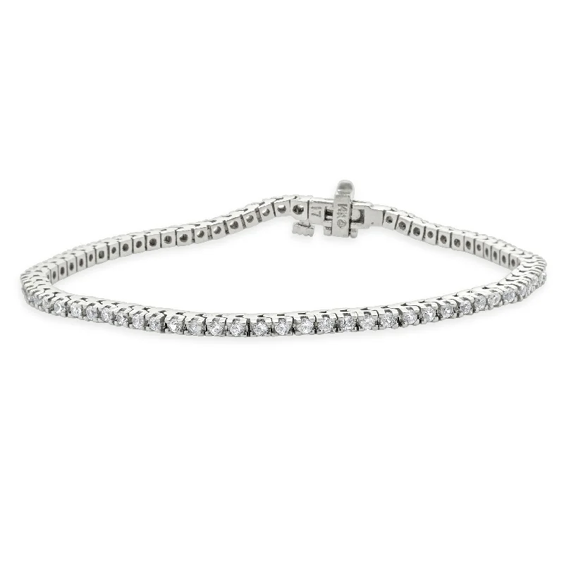 Ladies gold tone bracelets-14 Karat White Gold White Sapphire Tennis Bracelet