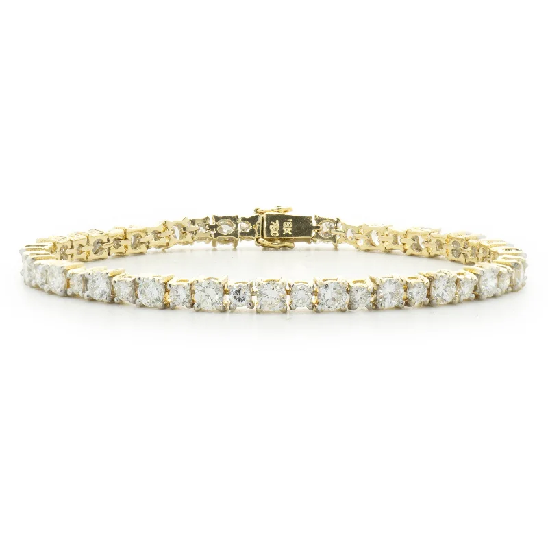 Ladies thick bangles-18 Karat Yellow Gold Graduated Diamond Tennis Bracelet