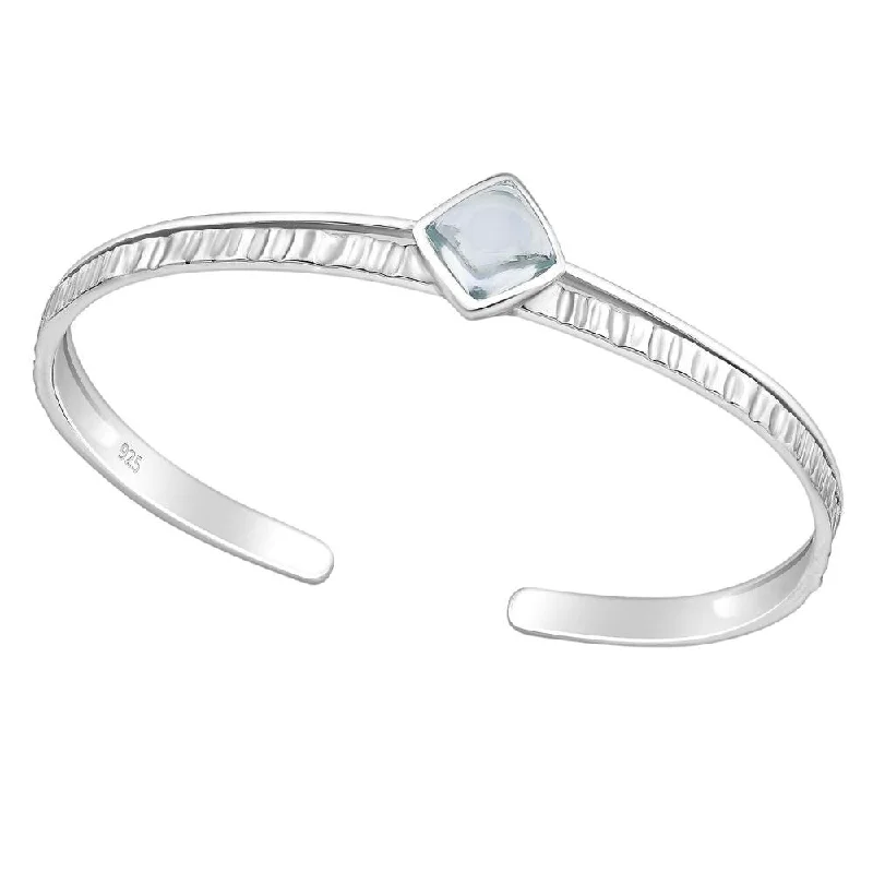 Ladies chunky bracelets-Sterling Silver Textured Cuff Bracelet with Sky Blue Topaz