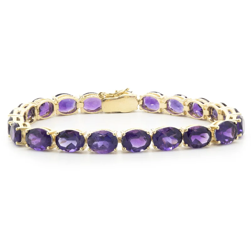 Ladies ruby bracelets-14 Karat Yellow Gold Amethyst Inline Bracelet