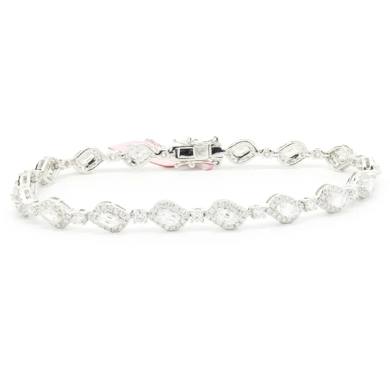 Ladies love bracelets-18 Karat White Gold Flame Cut Diamond Inline Bracelet