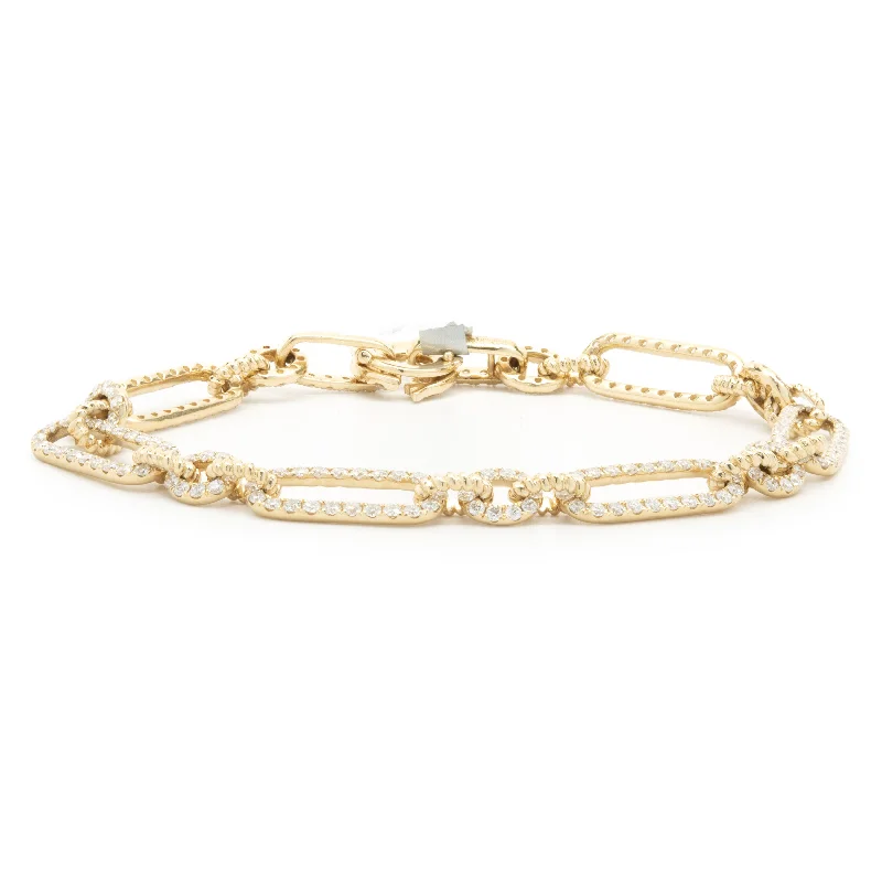 Ladies gold charm bracelets-14 Karat Yellow Gold Diamond Oval Link Bracelet